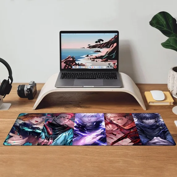 Jujutsu Kaisen anime mouse pad on desk with laptop